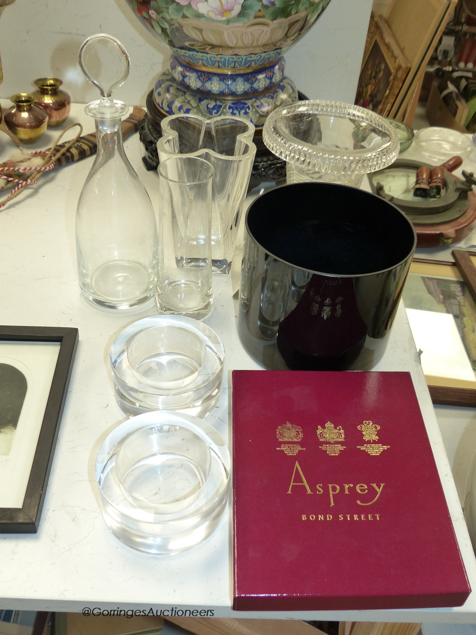 A boxed Aspreys cut glass and plate photgraph frame and seven items of glassware